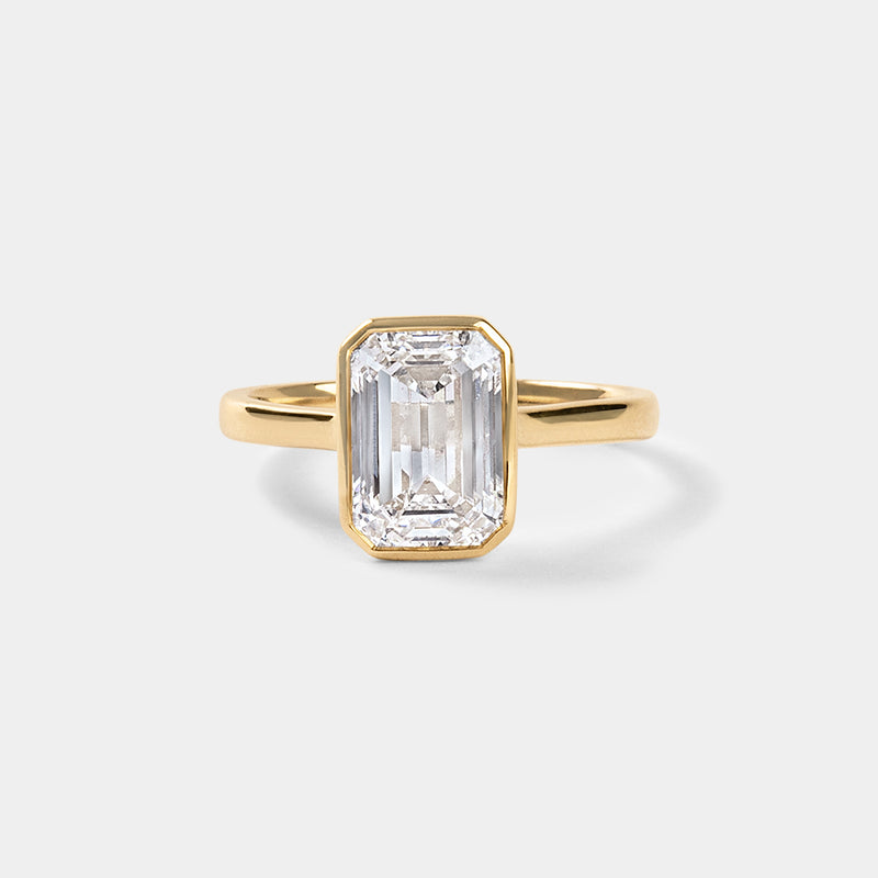 Bezel set Emerald CUT SOLITAIRE ENGAGEMENT RING — (1)
