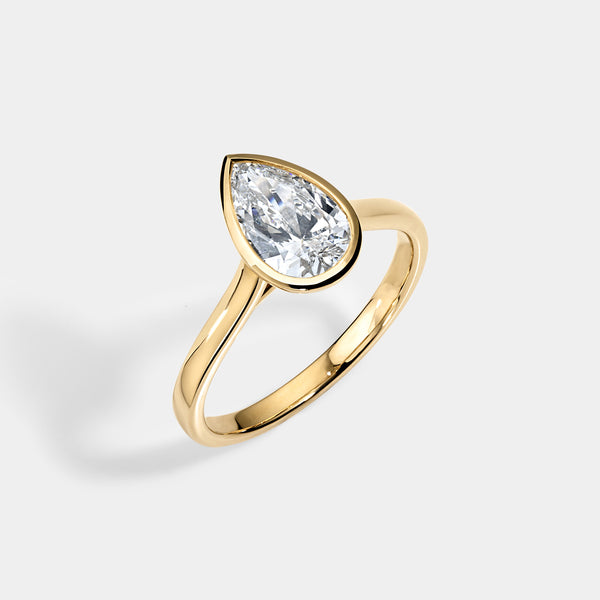 Bezel set Pear CUT SOLITAIRE ENGAGEMENT RING
