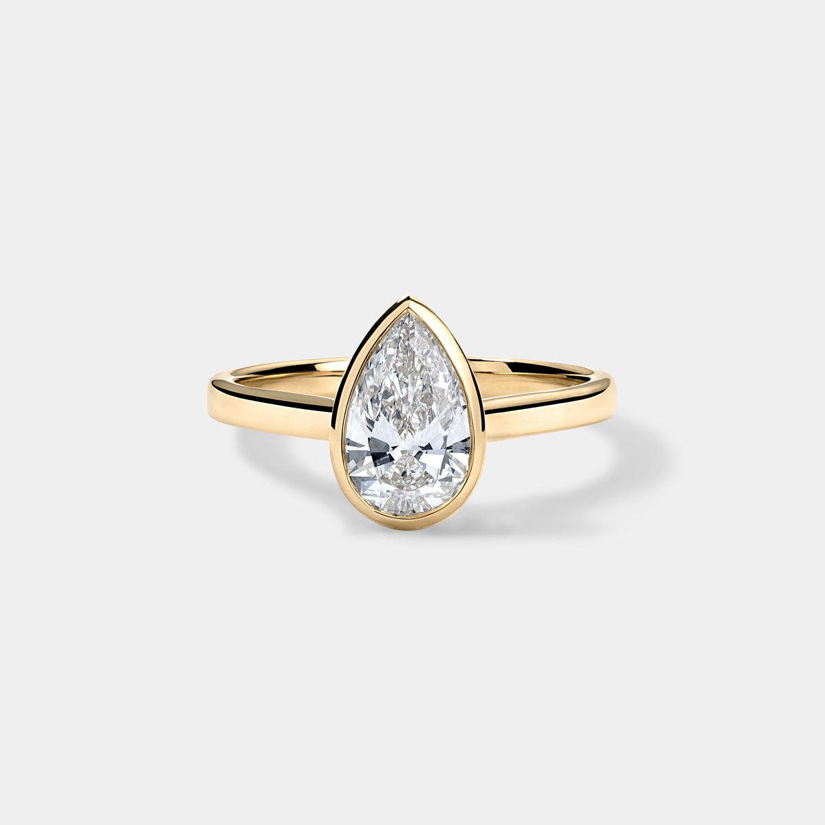 Bezel Set Pear Cut Solitaire Engagement Ring