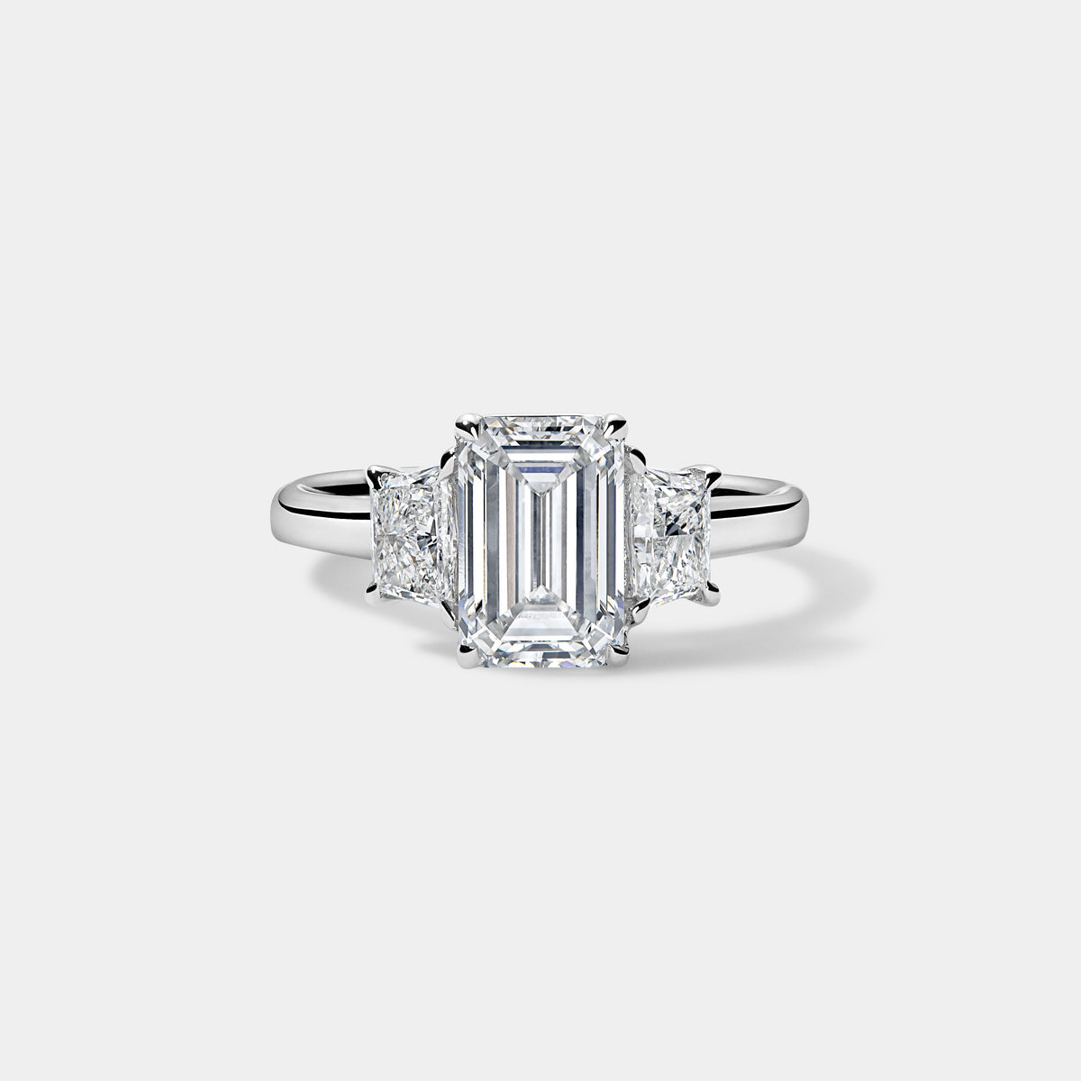 Emerald Cut Engagement Ring with Trapezoids