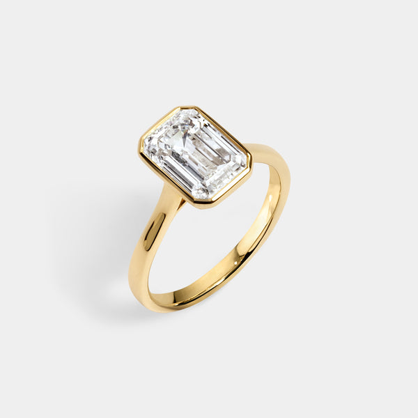 Bezel set Emerald CUT SOLITAIRE ENGAGEMENT RING — (1)